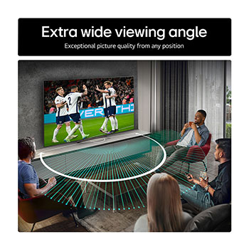 Living room space with a wall-mounted LG OLED TV. On the TV is a mountain range against a dark evening sky filled with stars. This scene is split in half. One side shows a duller, grayer version of the landscape labeled, Non Perfect Black display. On the other side is a more pleasing picture with a larger dynamic range of blacks and whites. 