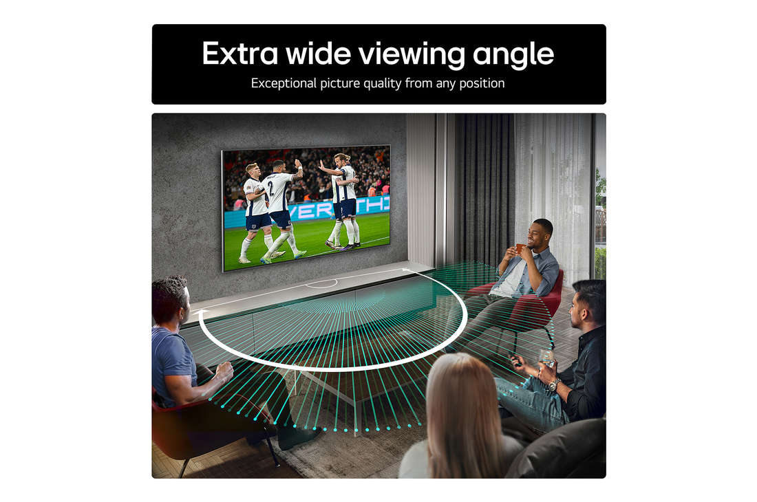 Living room space with a wall-mounted LG OLED TV. On the TV is a mountain range against a dark evening sky filled with stars. This scene is split in half. One side shows a duller, grayer version of the landscape labeled, Non Perfect Black display. On the other side is a more pleasing picture with a larger dynamic range of blacks and whites. 